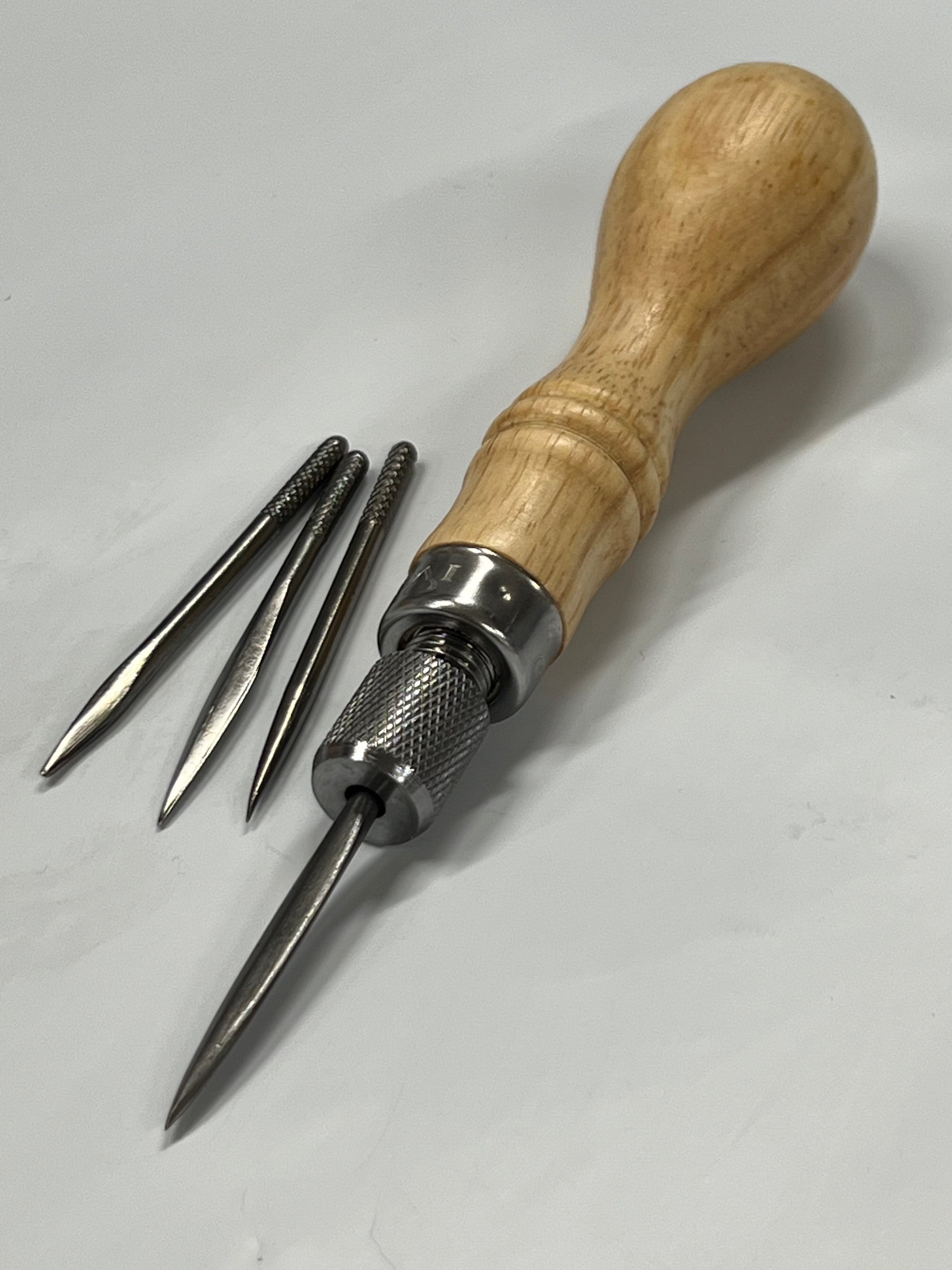 Awl with 4 different blades