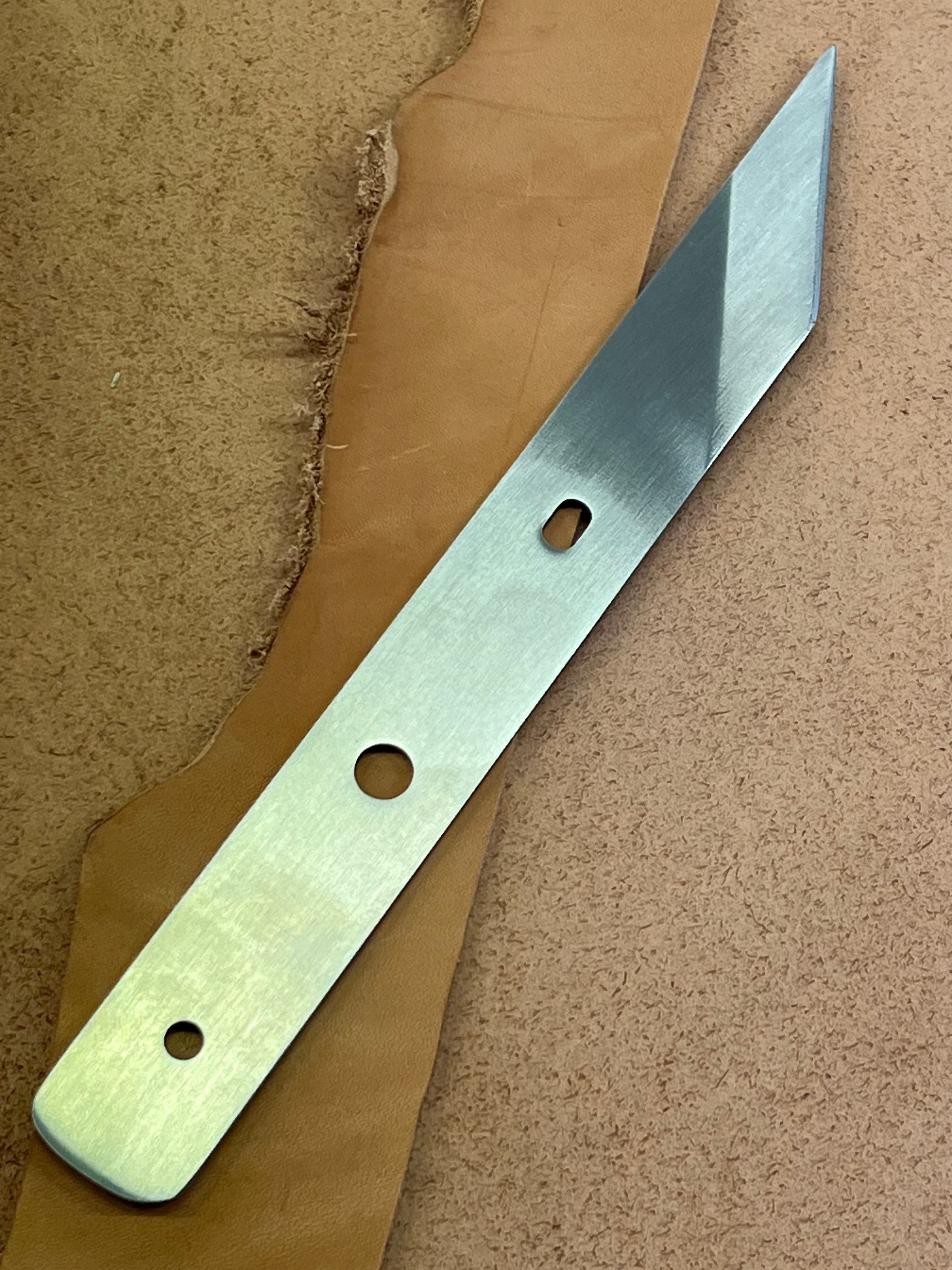 French-style angled leather knife blade