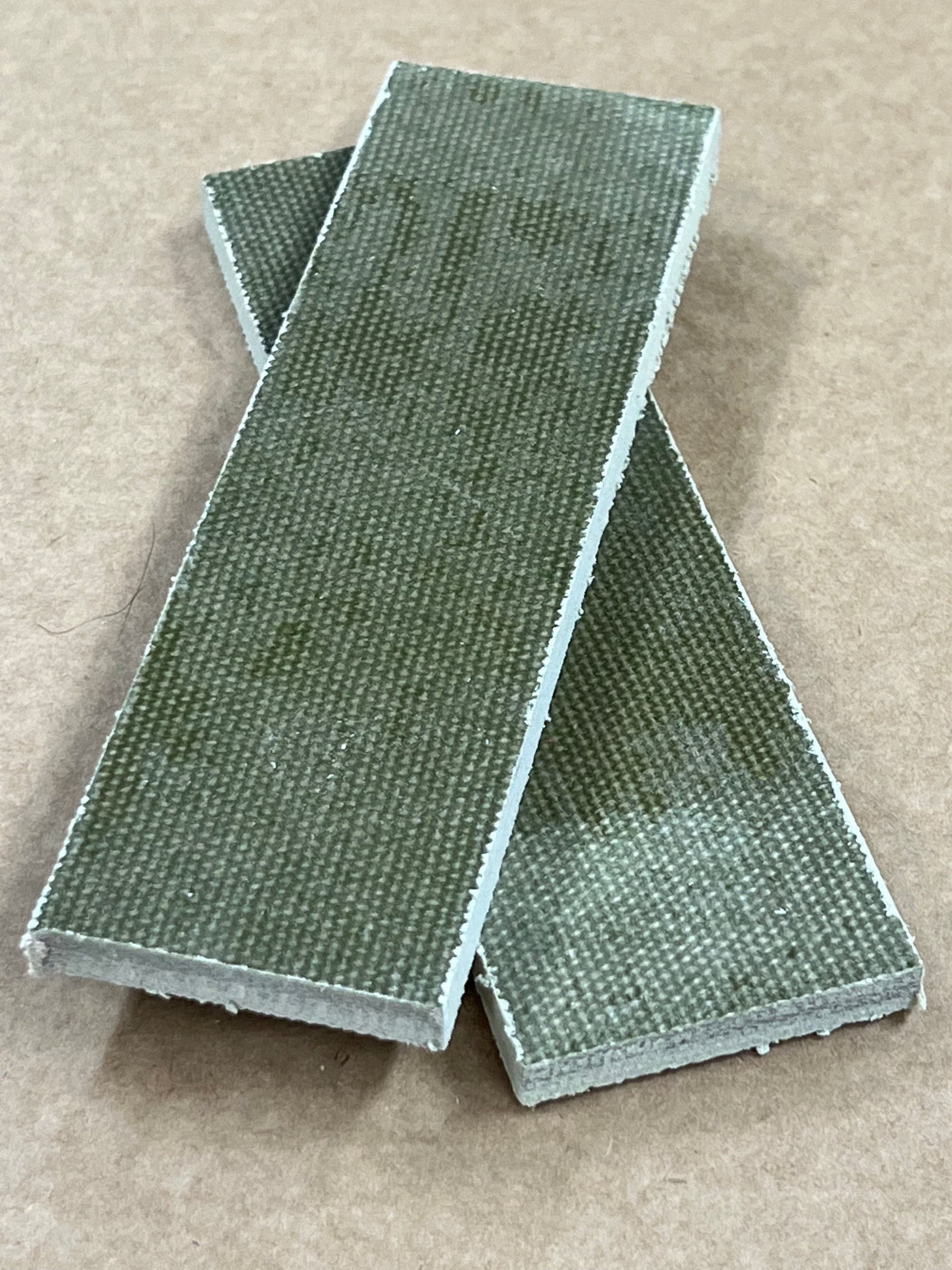 Micarta plate handle material