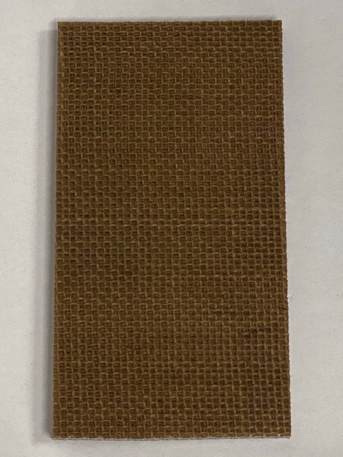 Micarta plate handle material