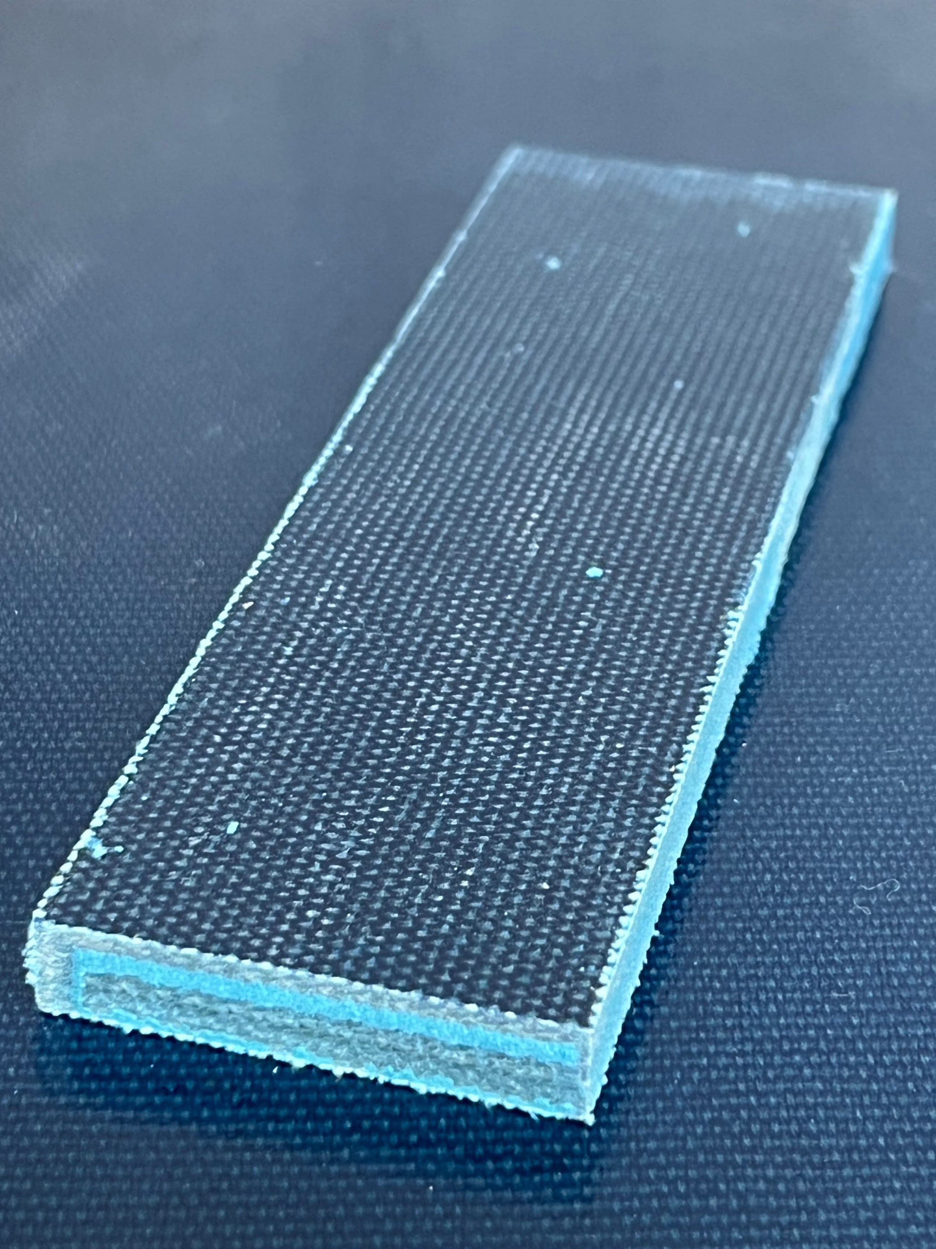 Micarta plate handle material