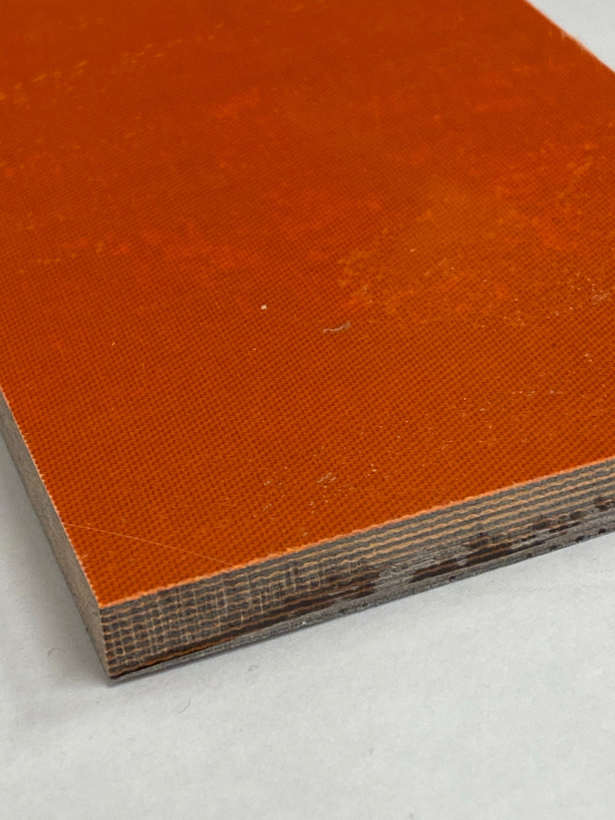 Micarta plate handle material