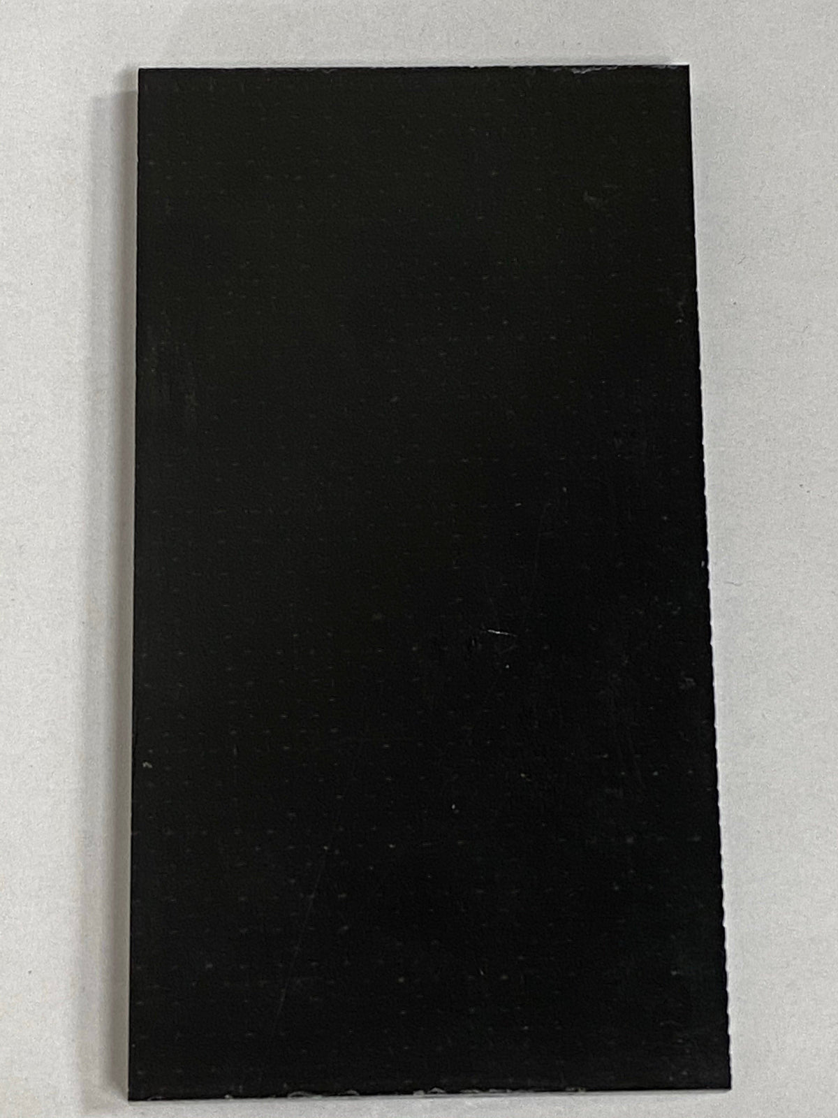 Micarta plate handle material