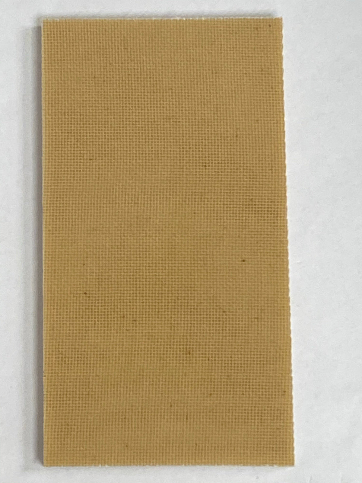 Micarta plate handle material
