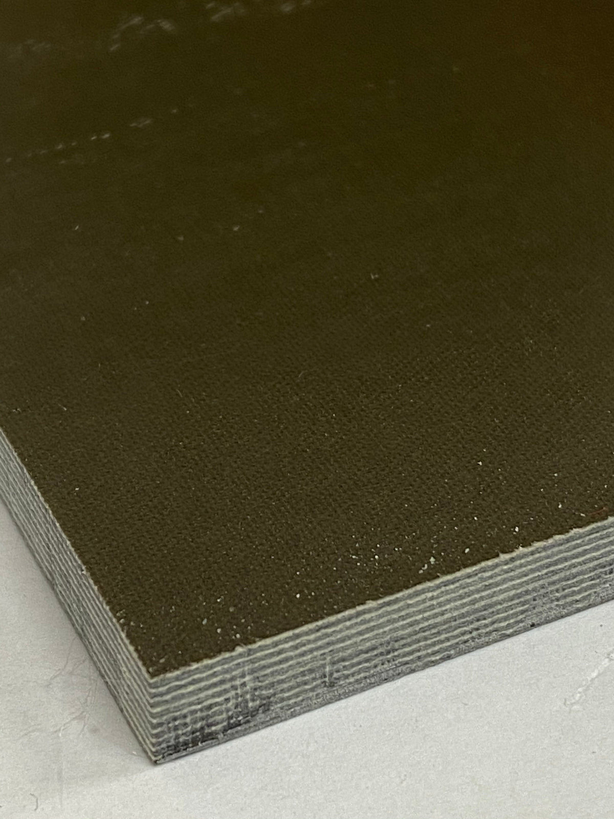 Micarta plate handle material