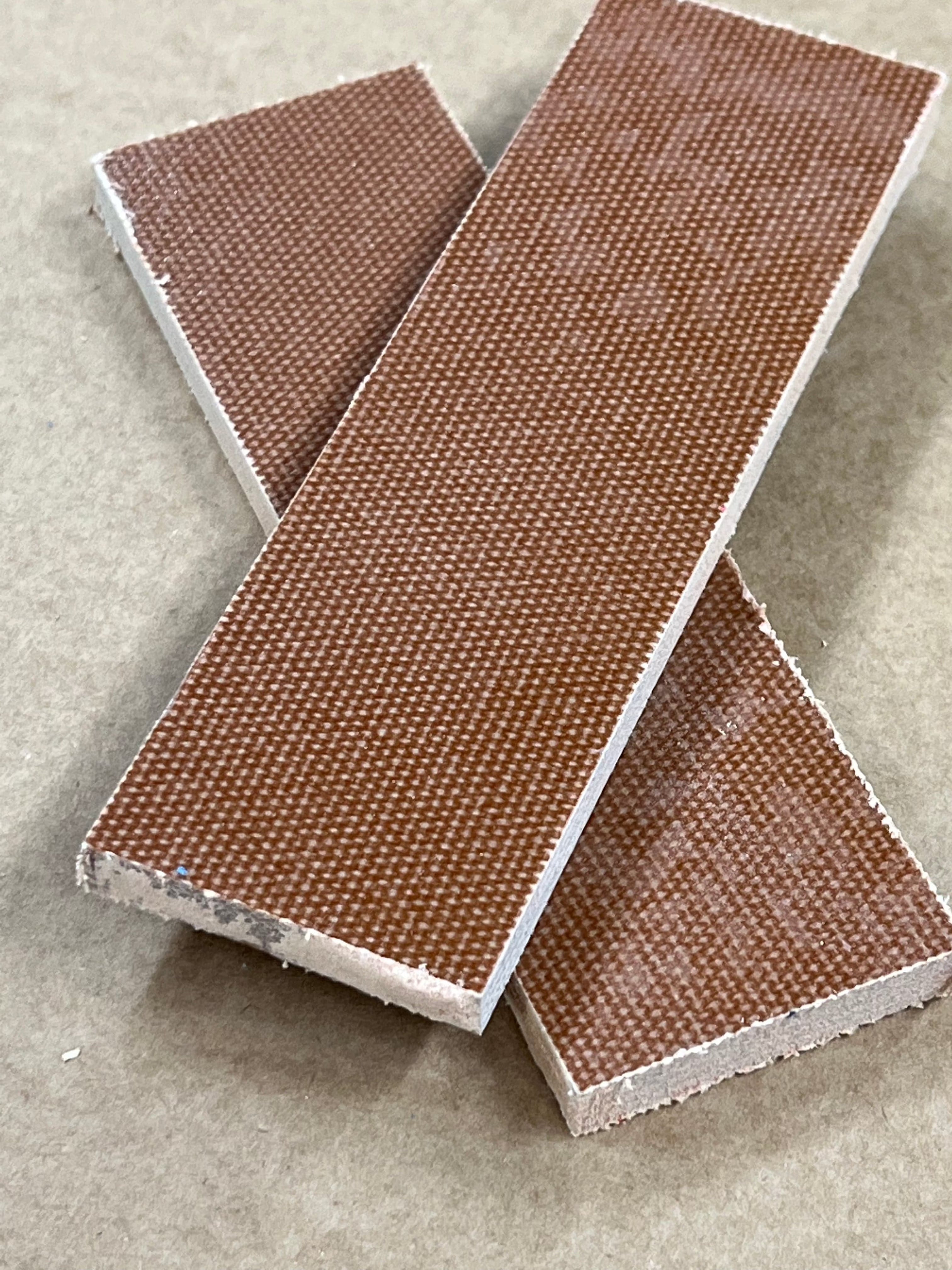 Micarta plate handle material