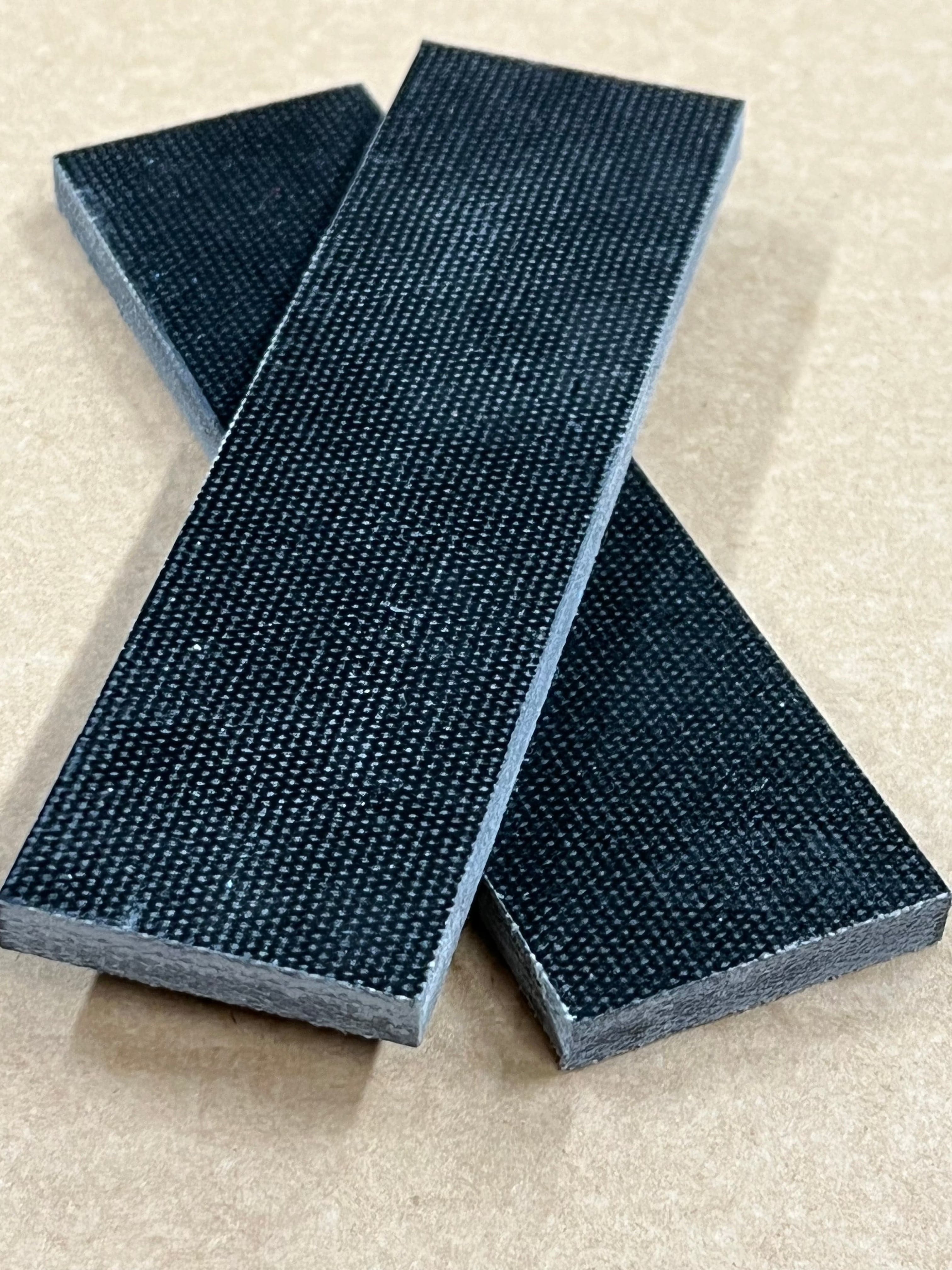 Micarta plate handle material