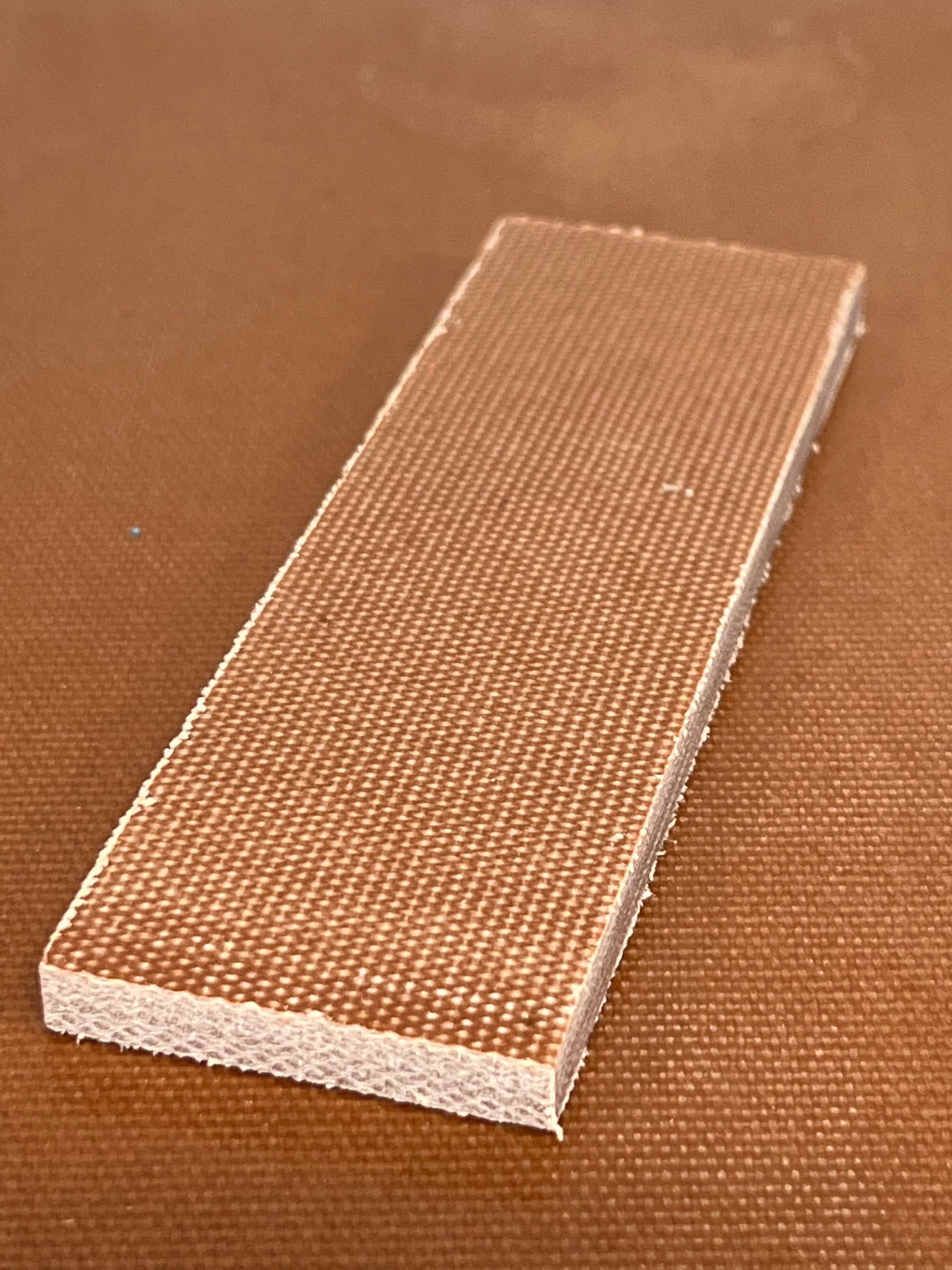 Micarta plate handle material
