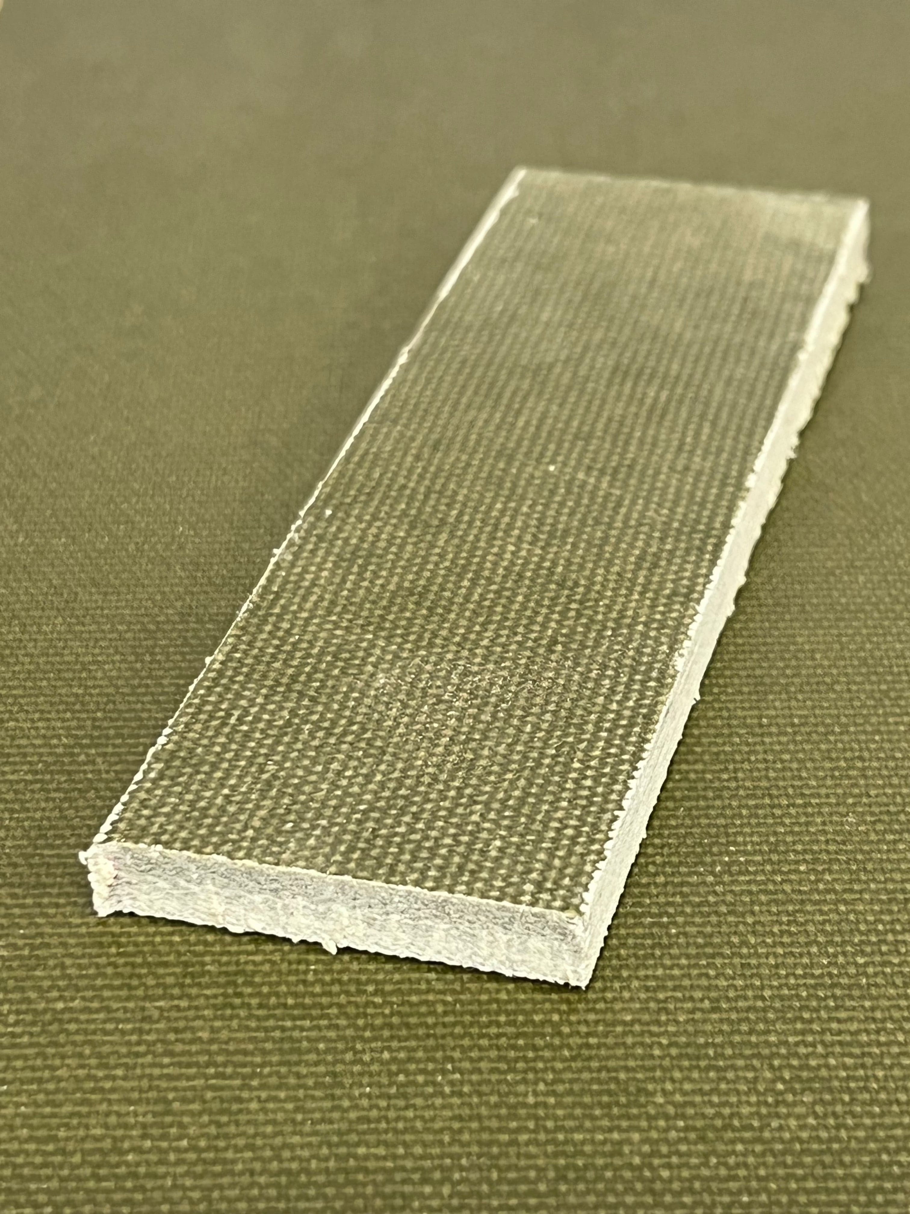 Micarta plate handle material