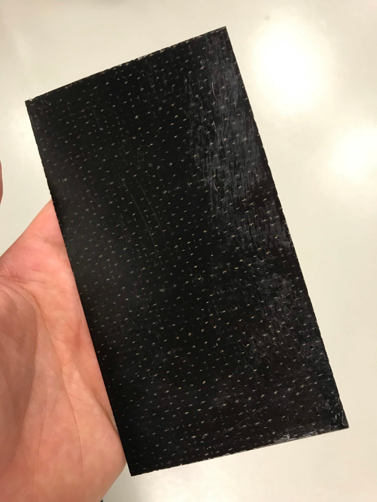 Micarta plate handle material