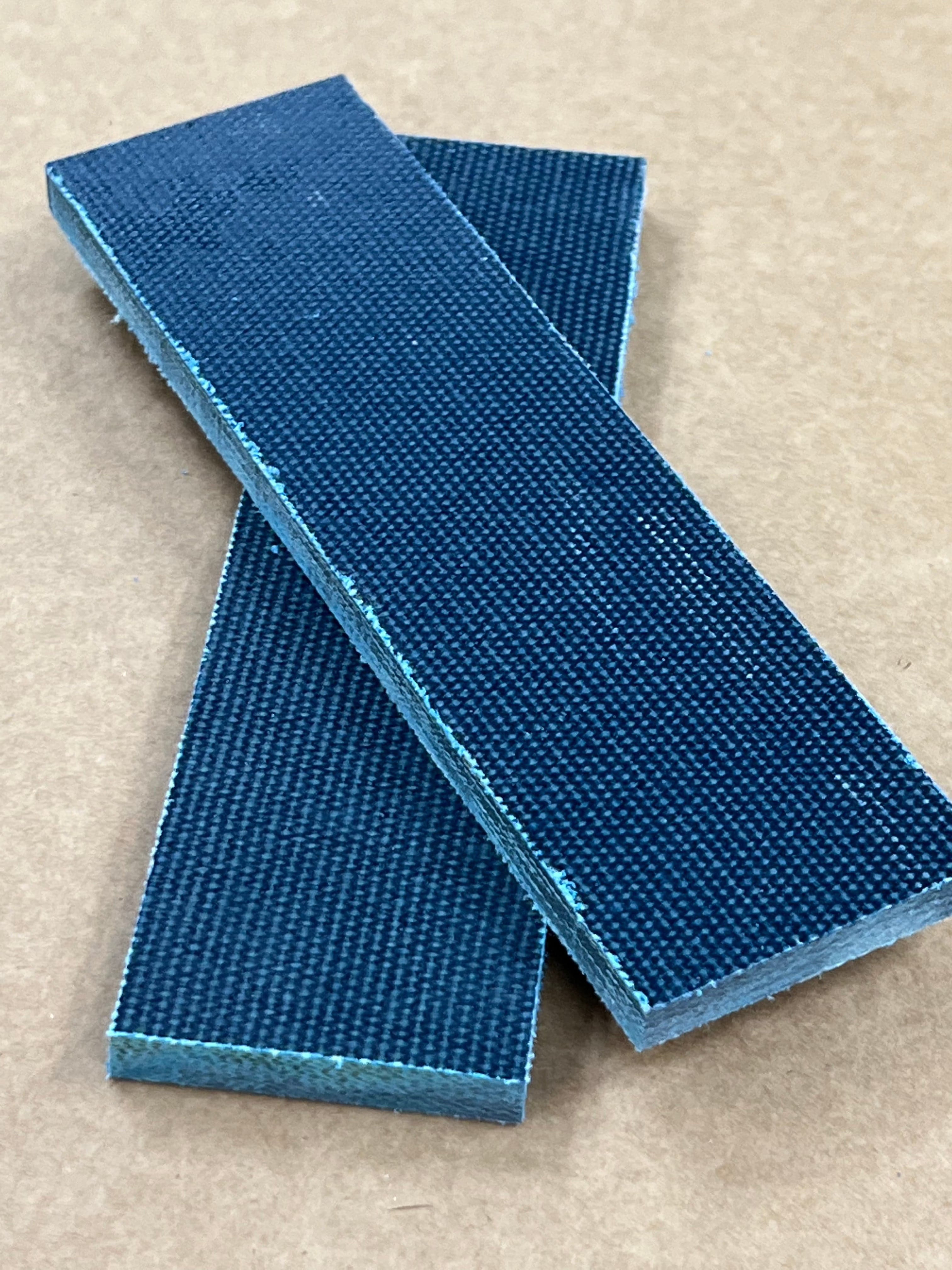 Micarta plate handle material