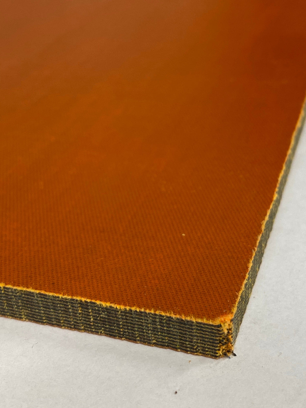Micarta plate handle material