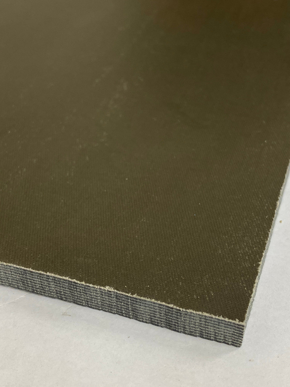 Micarta plate handle material